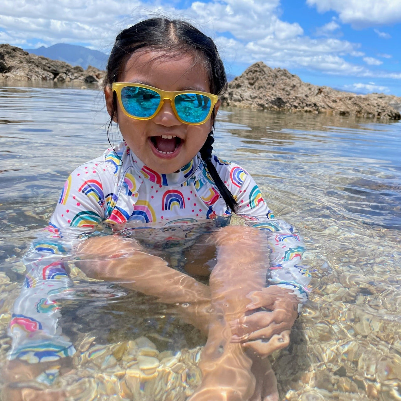 Little girl wearing yellow polarized kids sunglasses