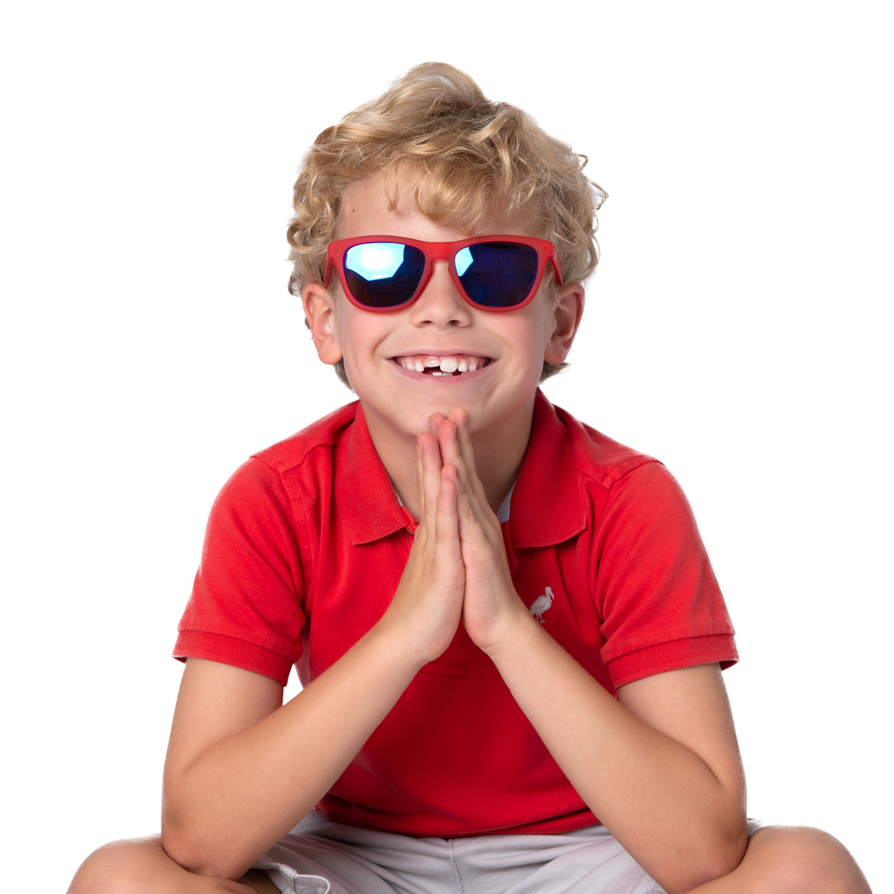 Little boy wearing red polarized kids sunglasses 